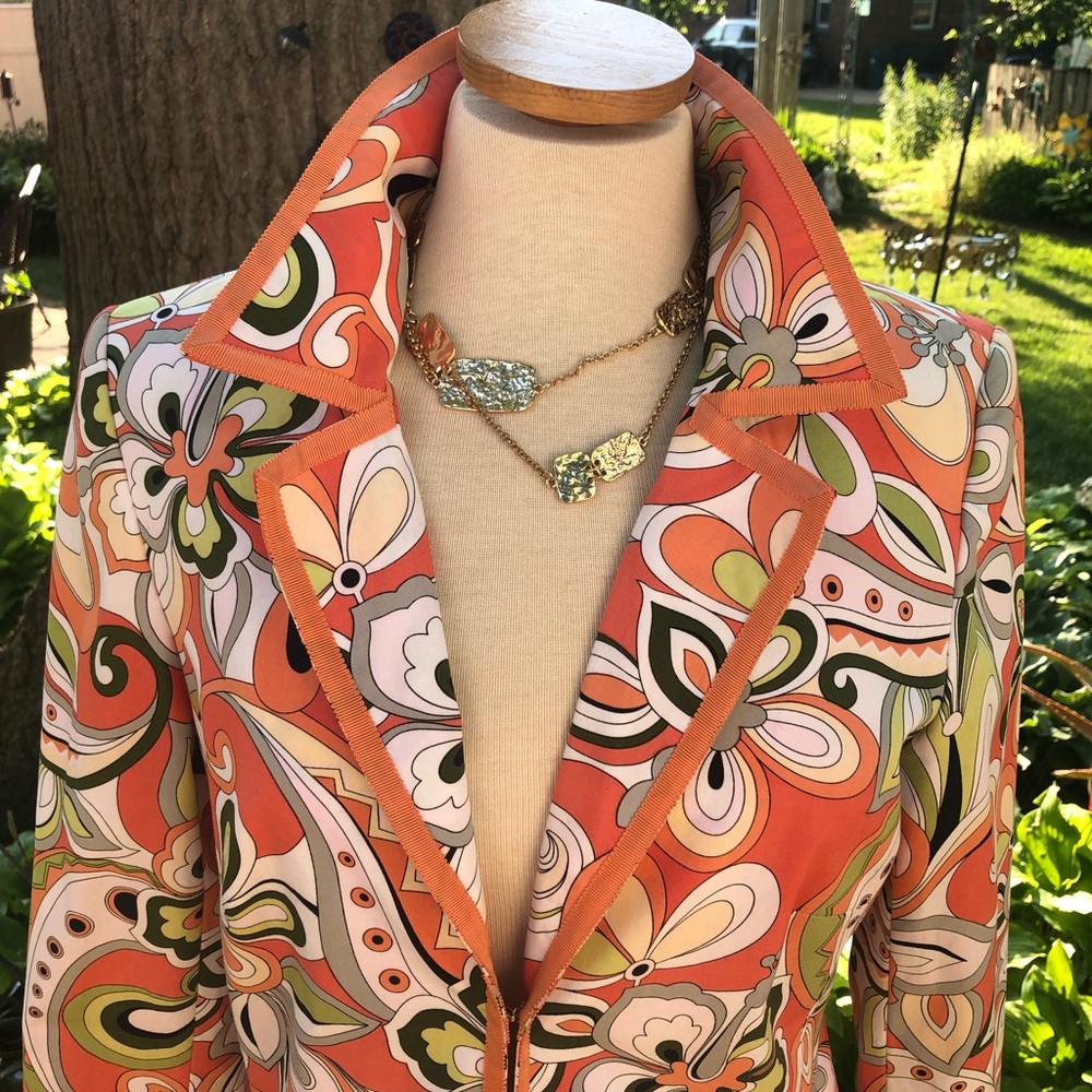 Long jacket with mod flower print.